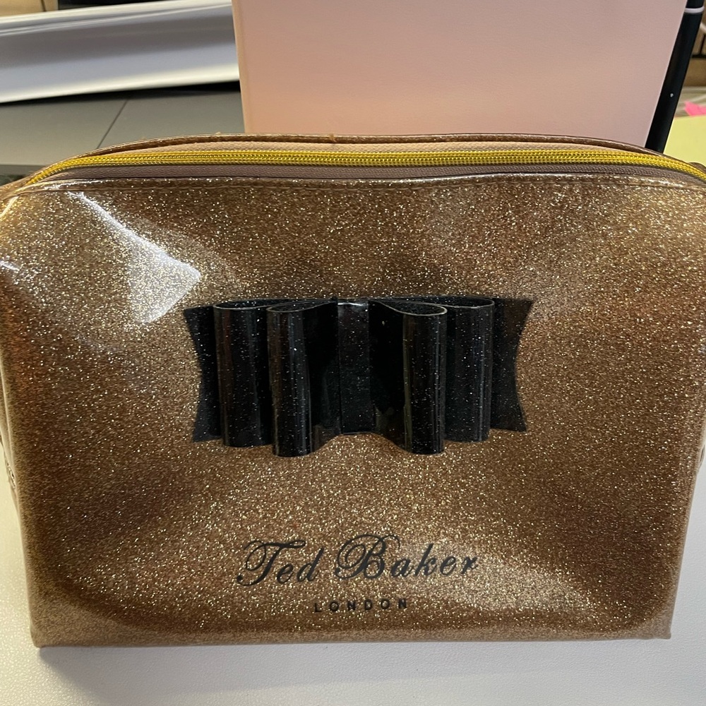 Ted Baker Gold Cosmetics bag.